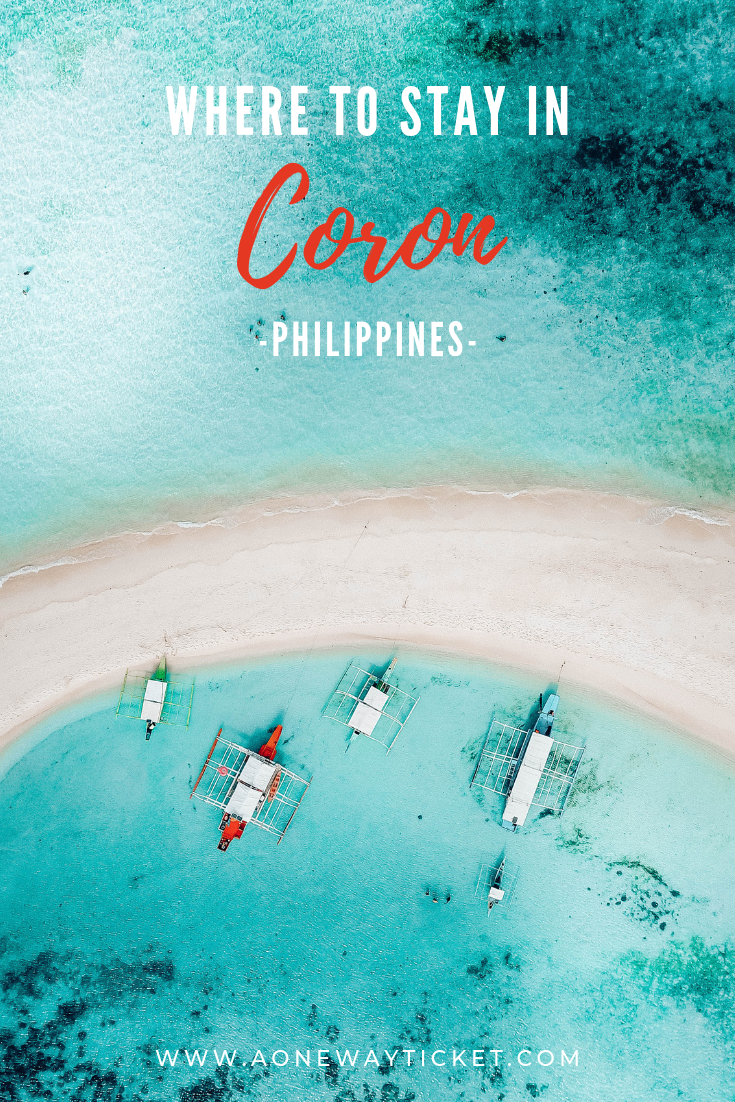 Drone photograph of white sand island against bright blue tropical water in the Philippines