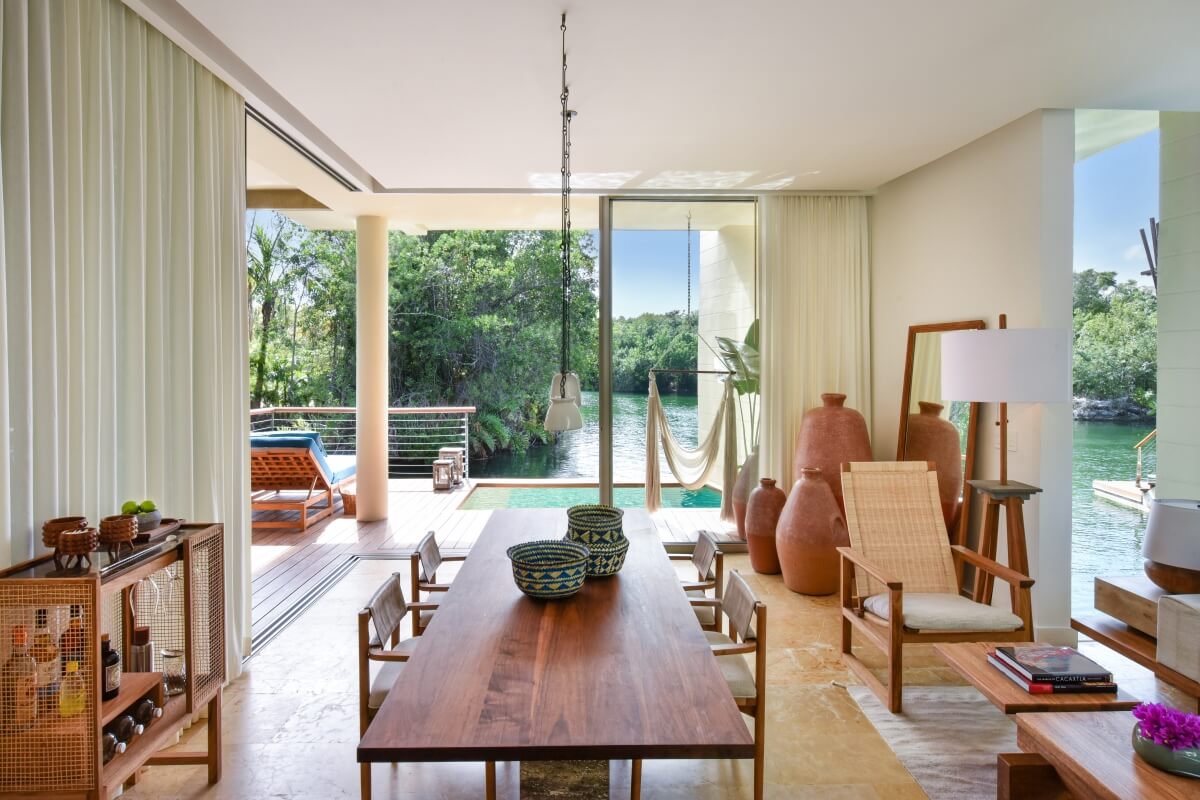 overwater bungalows in mexico rosewood mayakoba dining room area