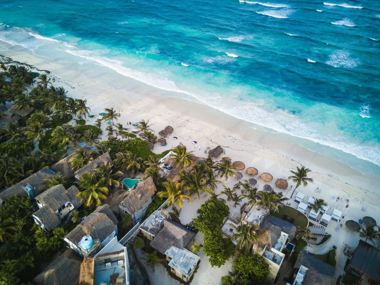 Learn all about the best adults only all-inclusive resorts in Mexico. You'll get to stay on beautiful, white sand beaches, just like this one!