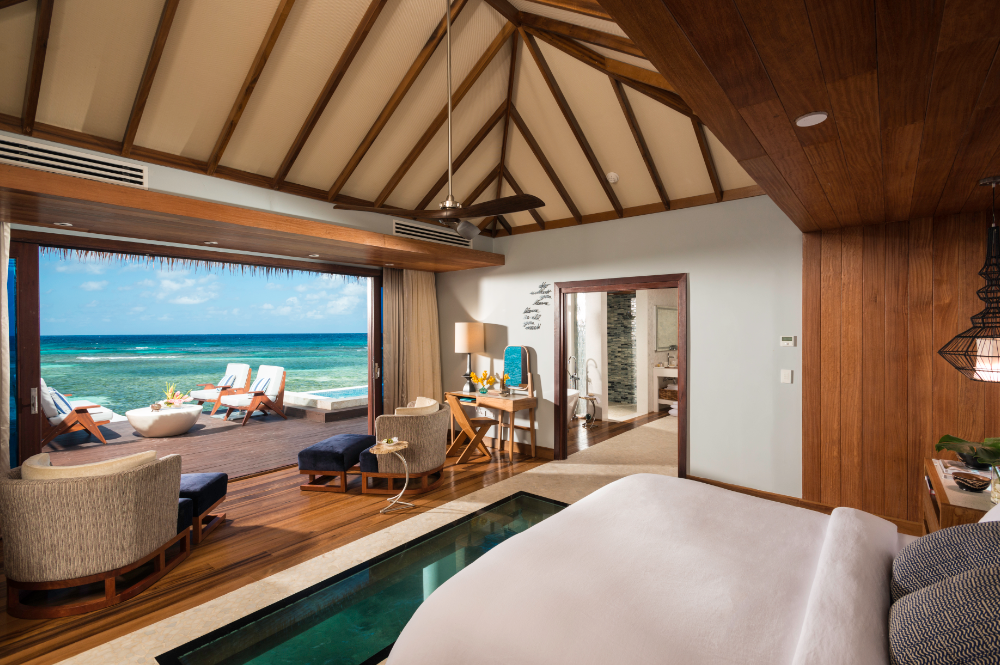 inside an overwater villa at sandals royal caribbean