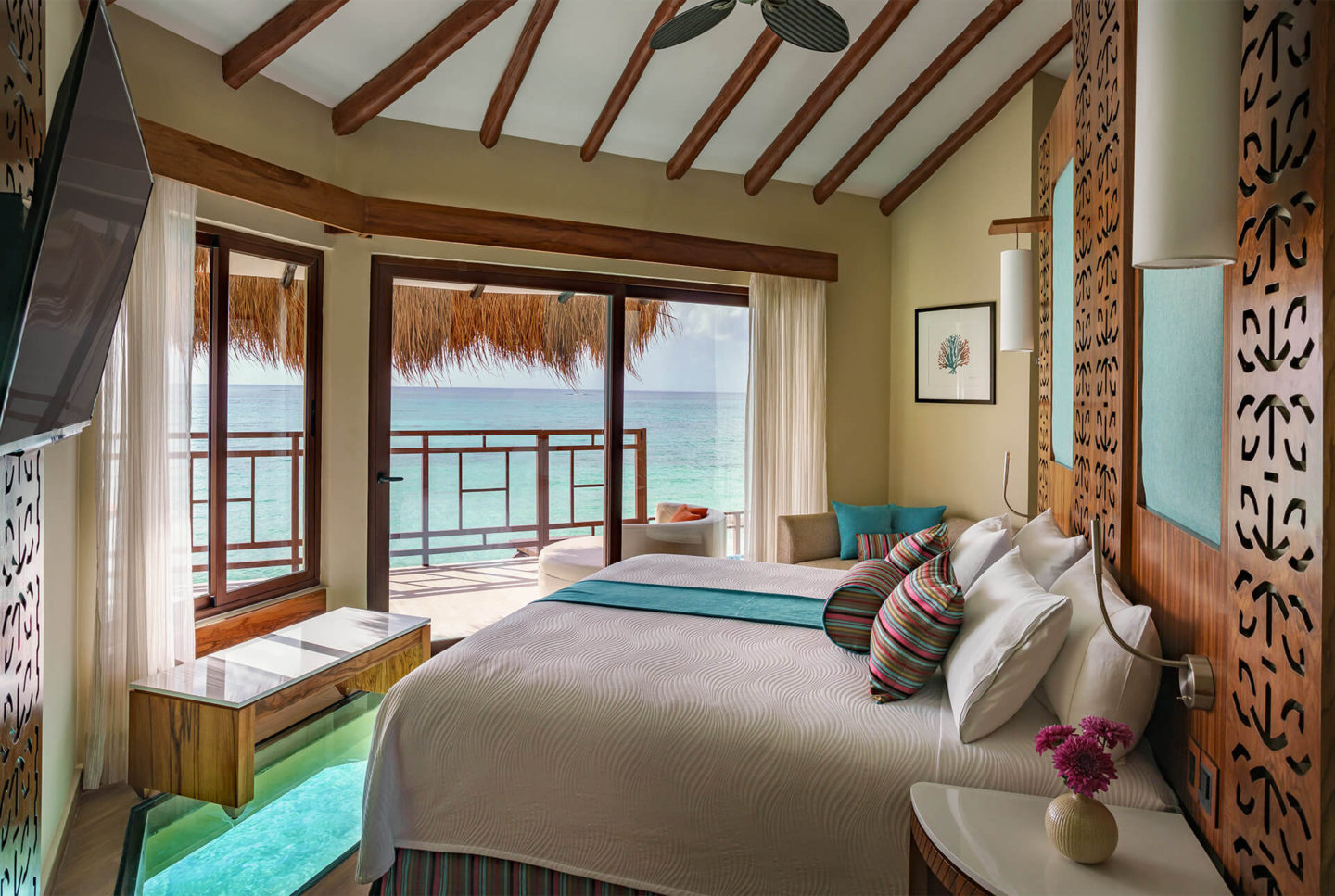 interior view of overwater bungalows in the caribbean palafitos el dorado maroma