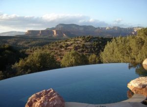 beautiful infinity pool at airbnb overlooking sedona red rocks