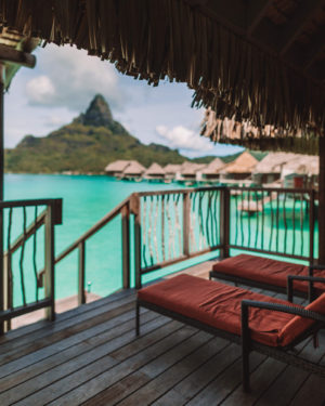view of mount otemanu in bora bora from inside an overwater bungalow at intercontinental thalasso resort