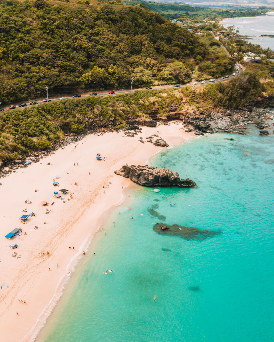 aerial view of waimea bay beach park which is one of the top things to do in oahu hawaii