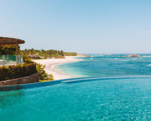 nuna infinity pool with view overlooking the pacific ocean at four seasons punta mita