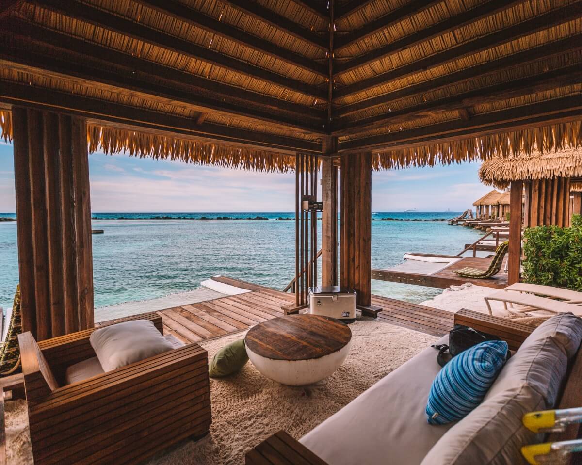 interior of private beach cabanas at renaissance island with flamingo beach aruba